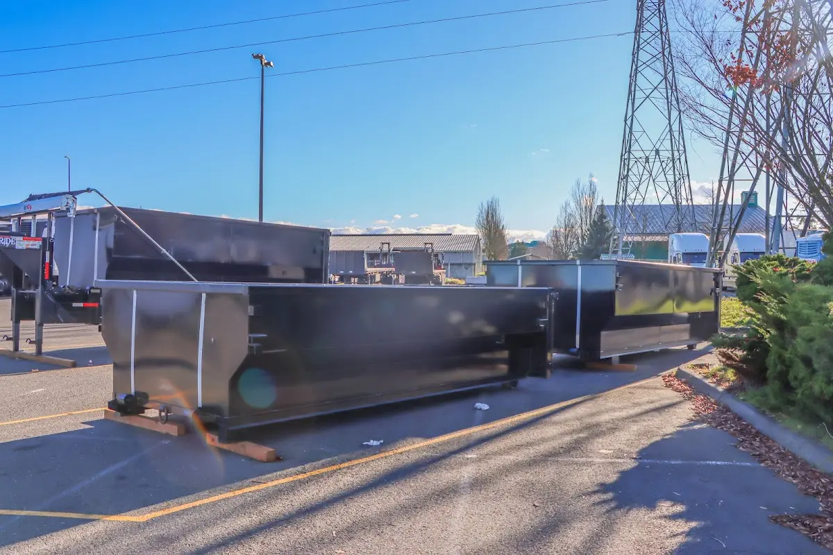 Roll-off dumpster ready for waste disposal at job site for 3 Yard Dumpster Rental in Selma